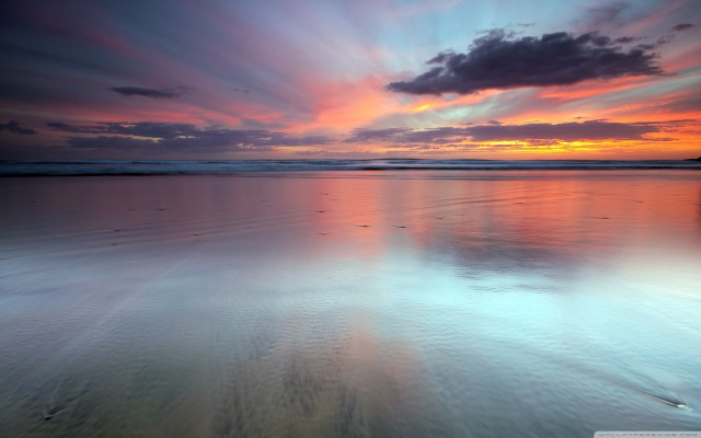 Sunset beach water clouds footprints free wallpaper for desktop - medium preview image