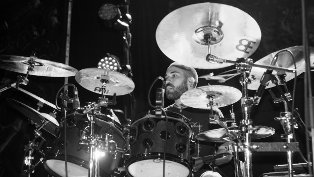 Bearded man playing drums concert free wallpaper for desktop - medium preview image