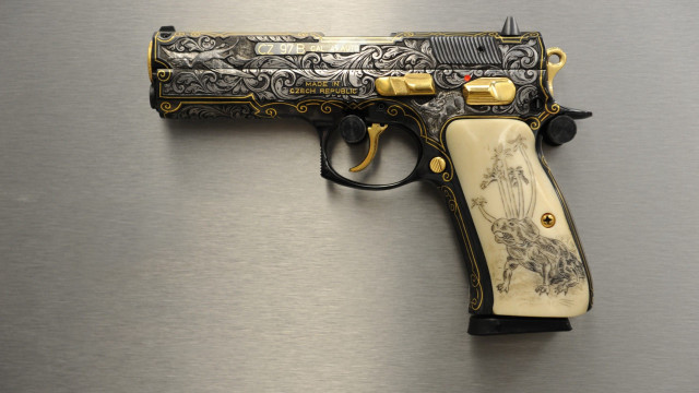 Gold black gun design handle free wallpaper for desktop - medium preview image