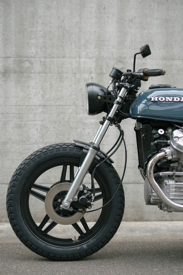 Motorcycle parked road wall sign #2 free wallpaper for mobile - medium preview image