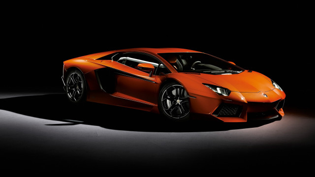 Orange sports car dark room #4 free wallpaper for desktop - medium preview image