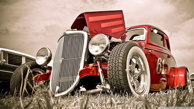 Red car field grass dump free wallpaper for desktop - medium preview image