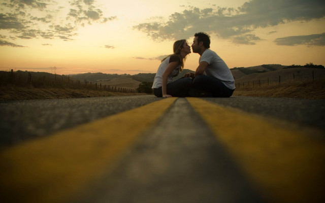 Man woman kissing road sunset #2 free wallpaper for desktop - medium preview image