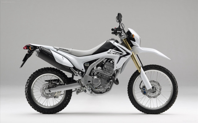 White motorcycle parked white floor free wallpaper for desktop - medium preview image