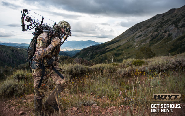 Man bow arrows field mountains free wallpaper for desktop - medium preview image