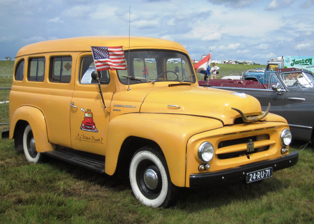 Yellow truck parked field cars free wallpaper for desktop - medium preview image