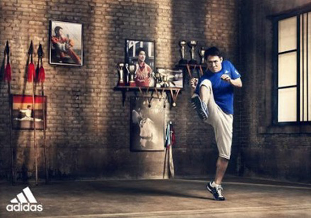 Man kicking soccer brick wall free wallpaper for desktop - medium preview image