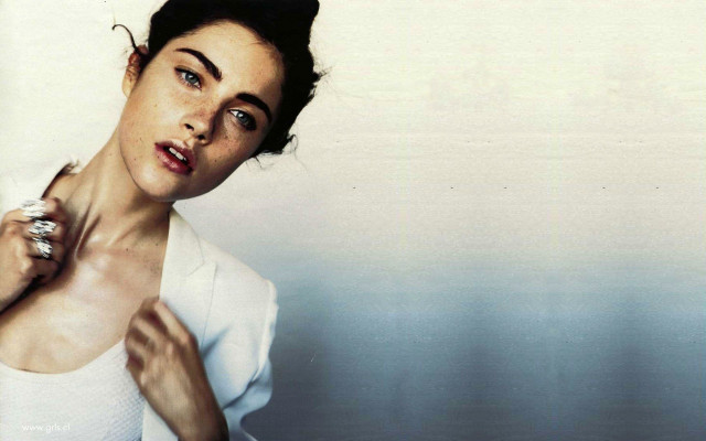 Woman white shirt holding ring free wallpaper for desktop - medium preview image