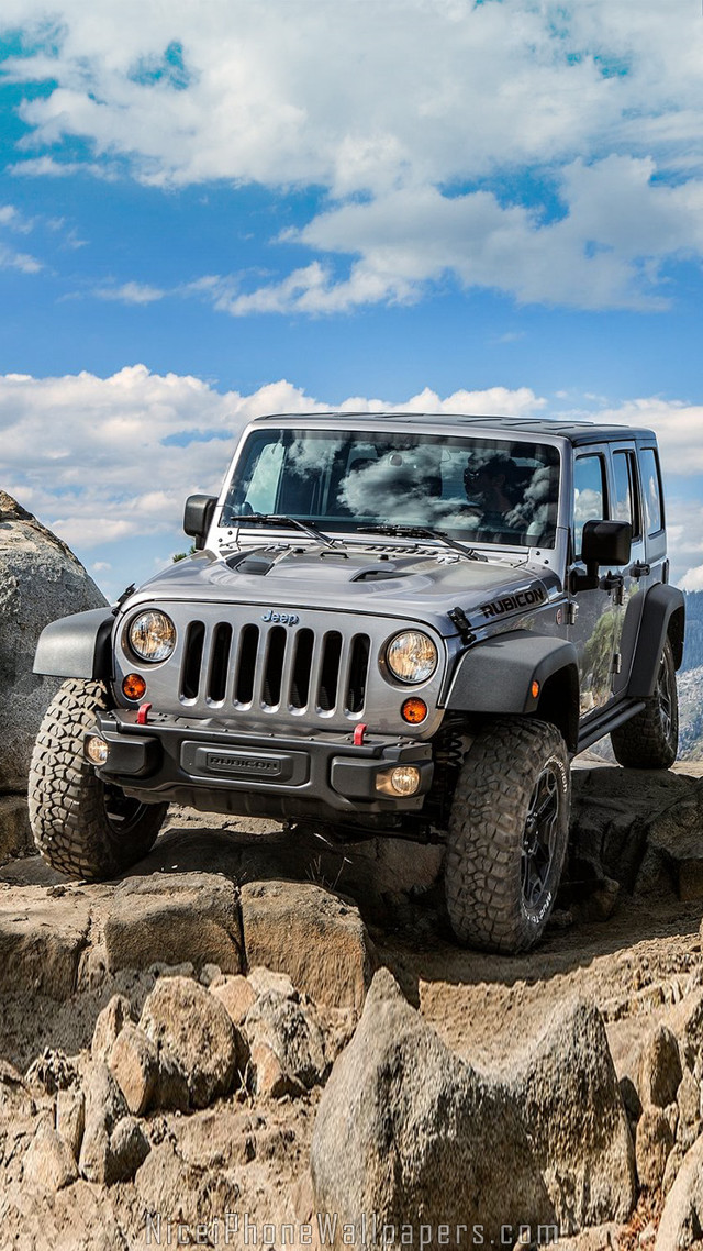 Jeep parked rocky hill mountains #2 free wallpaper for mobile - medium preview image