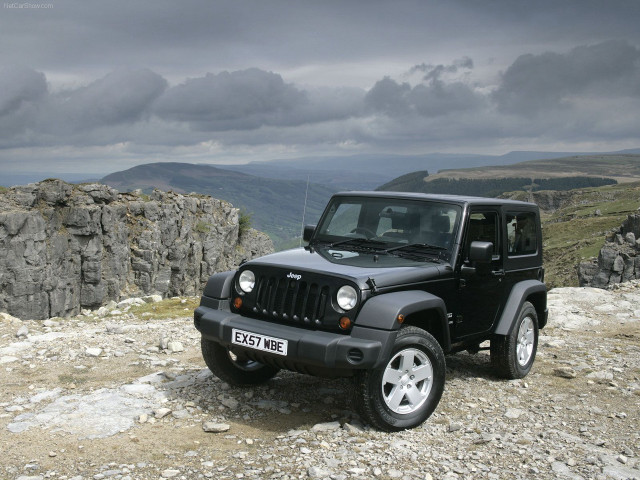 Black jeep rocky hillside mountains free wallpaper for desktop - medium preview image