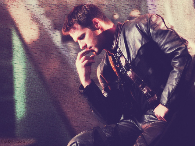 Man sitting wall smoking cigarette free wallpaper for desktop - medium preview image