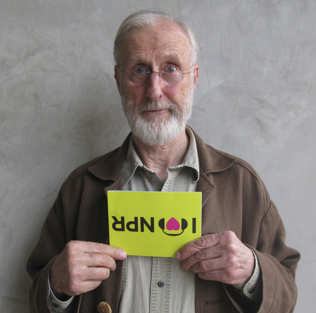 Man holding sign i love free wallpaper for tablet - medium preview image