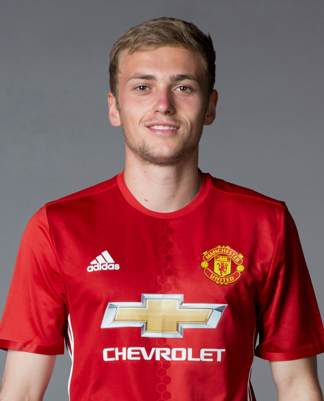 Man red shirt soccer ball #3 free wallpaper for mobile - medium preview image