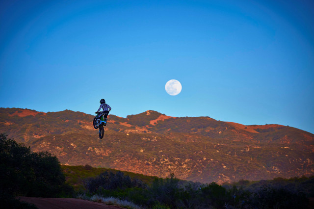 Motorcycle jump hill full moon free wallpaper for desktop - medium preview image