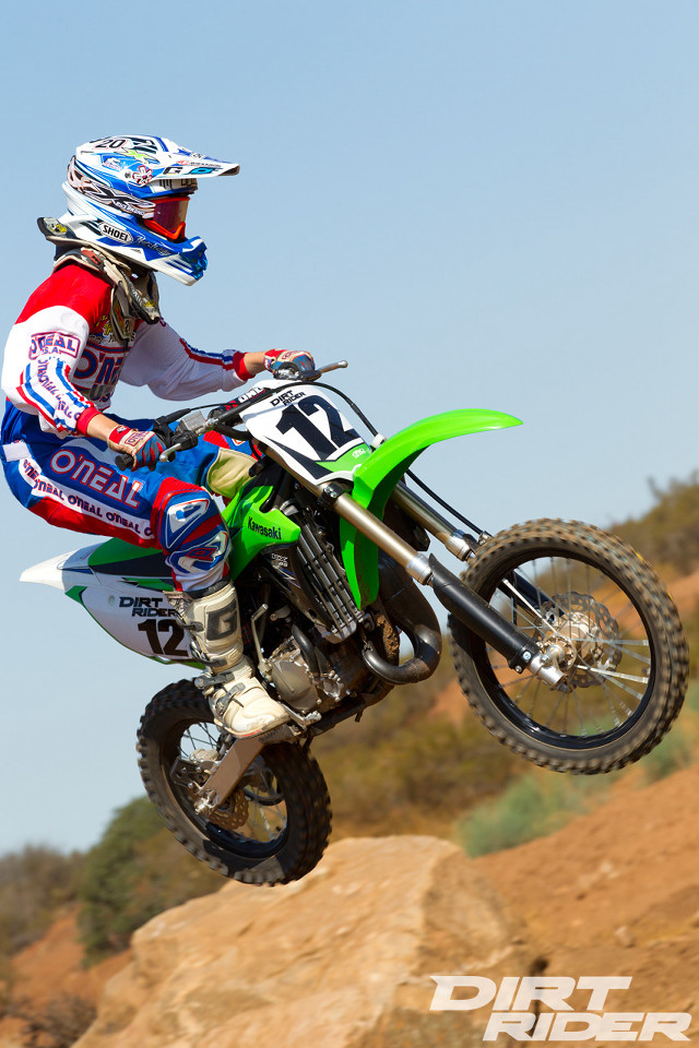 Man riding dirt bike air free wallpaper for mobile - medium preview image