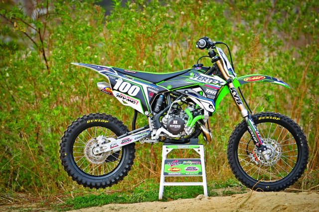 Dirt bike parked platform grass free wallpaper for desktop - medium preview image