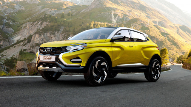 Yellow suv driving road mountain free wallpaper for desktop - medium preview image