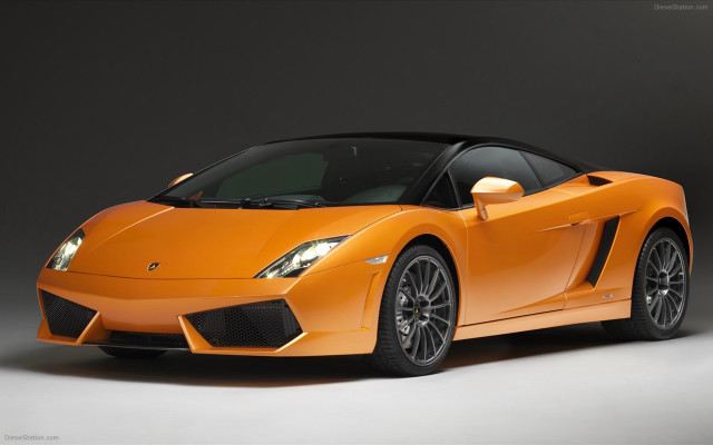 Orange sports car dark room #13 free wallpaper for desktop - medium preview image