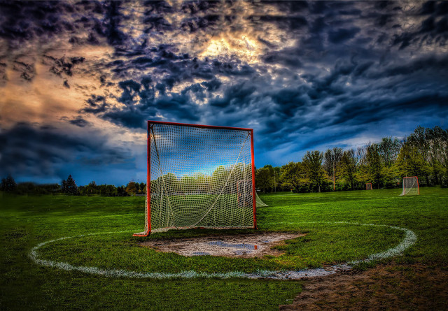 Goalie net cloudy sky grass free wallpaper for desktop - medium preview image