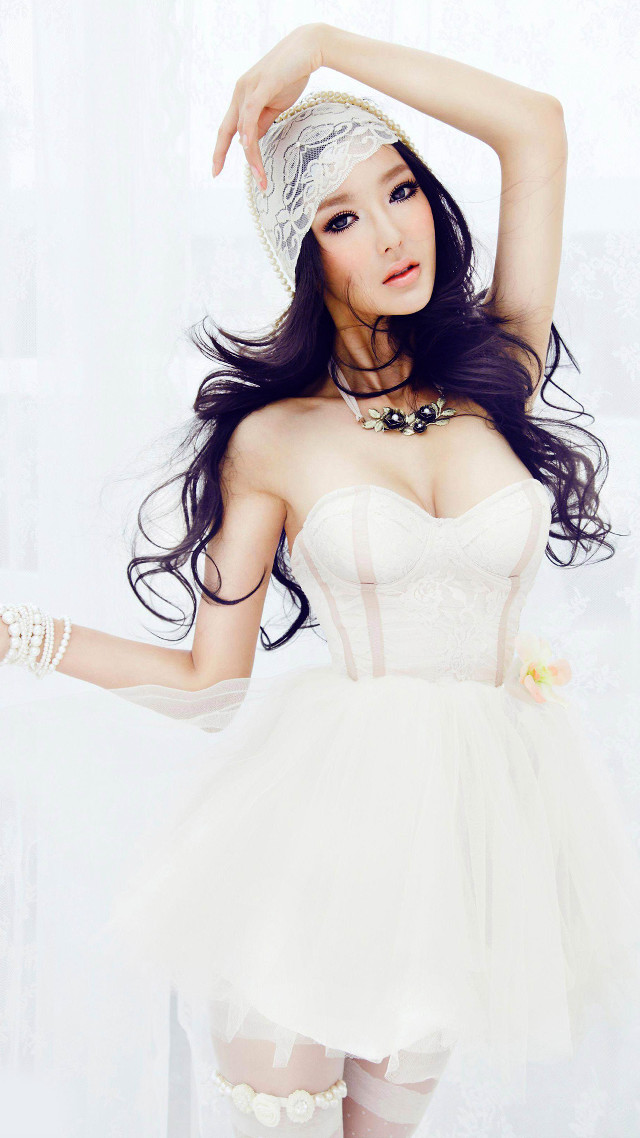 Woman white dress hat posing #3 free wallpaper for mobile - medium preview image