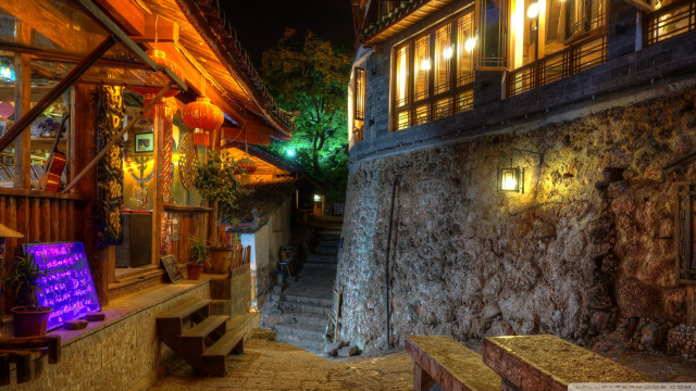 Stone building lit sign night free wallpaper for desktop - medium preview image