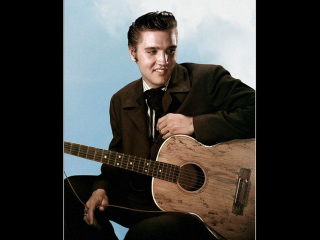 Man suit tie guitar pose free wallpaper for desktop - medium preview image