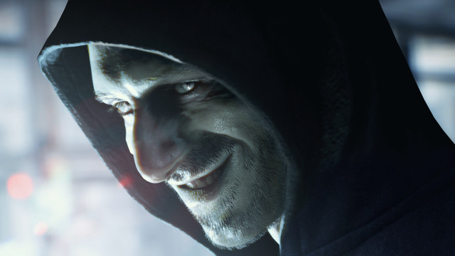 Man hooded jacket smiling camera free wallpaper for desktop - medium preview image