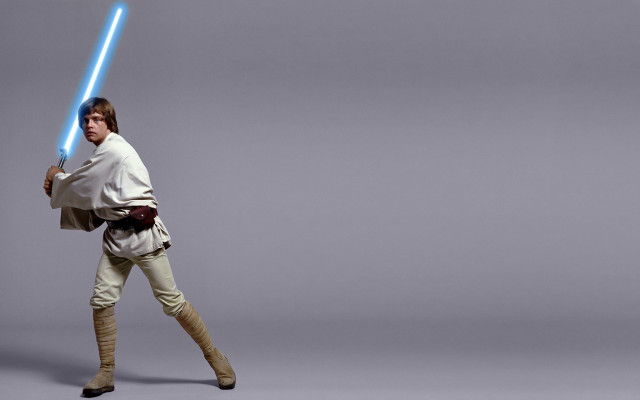 Man star wars costume holding free wallpaper for desktop - medium preview image