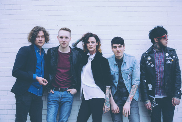 Young men white brick wall free wallpaper for desktop - medium preview image