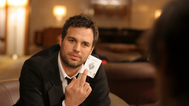 Man holding card sitting looking free wallpaper for desktop - medium preview image