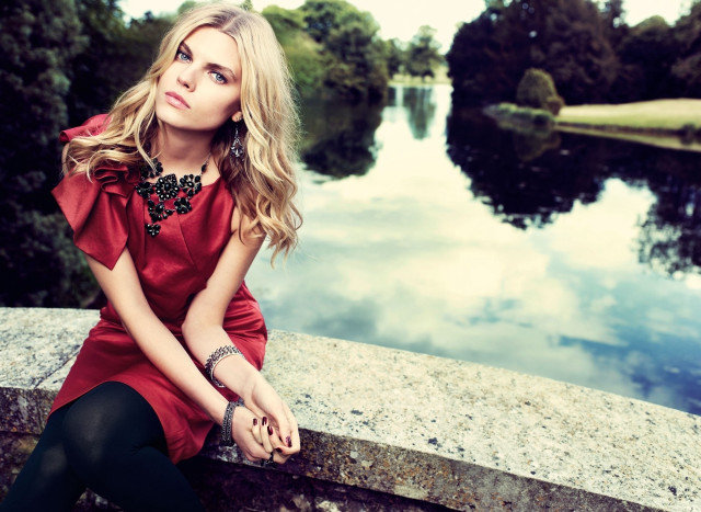 Woman sitting lake trees sky free wallpaper for desktop - medium preview image