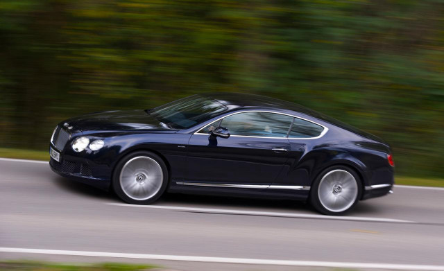 Black car driving road forest free wallpaper for desktop - medium preview image