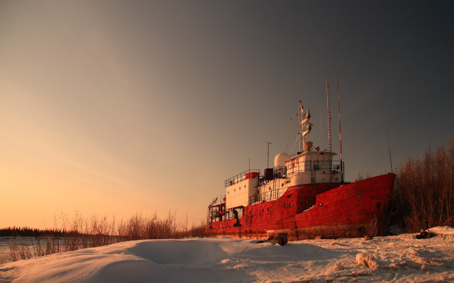 Large red boat snow field free wallpaper for desktop - medium preview image