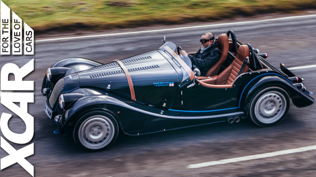 Man driving vintage car road free wallpaper for desktop - medium preview image