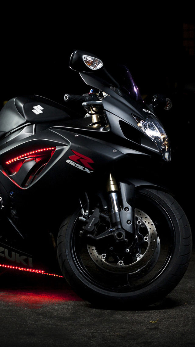Motorcycle parked dark room lights free wallpaper for mobile - medium preview image