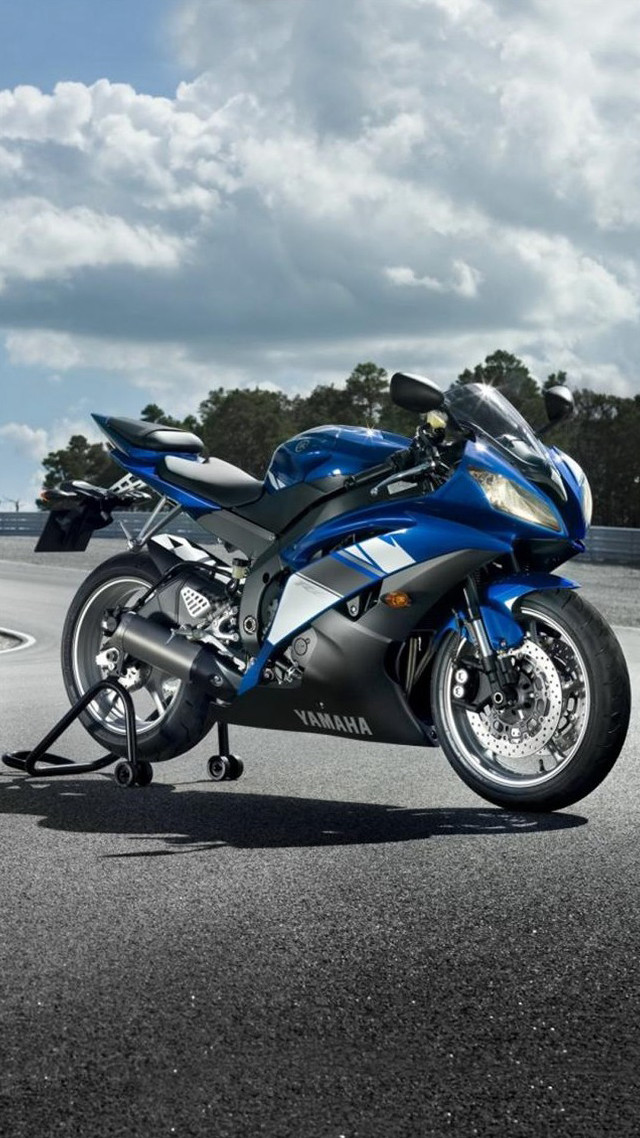 Blue motorcycle parking lot building #2 free wallpaper for mobile - medium preview image