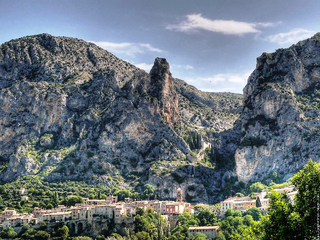 Mountain village nestled cloudy sky free wallpaper for desktop - medium preview image
