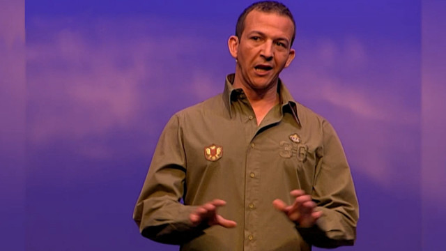 Man standing purple background hands free wallpaper for desktop - medium preview image