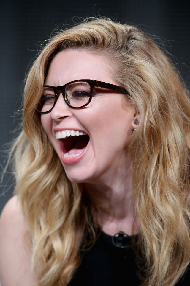 Woman laughing glasses blonde jewelry free wallpaper for mobile - medium preview image