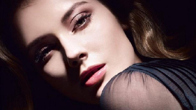 Woman longhair blackdress posing closedeyes free wallpaper for desktop - medium preview image