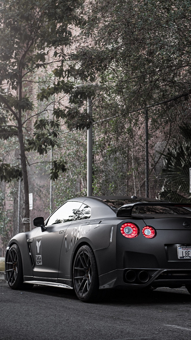 Black sports car tree lined free wallpaper for mobile - medium preview image