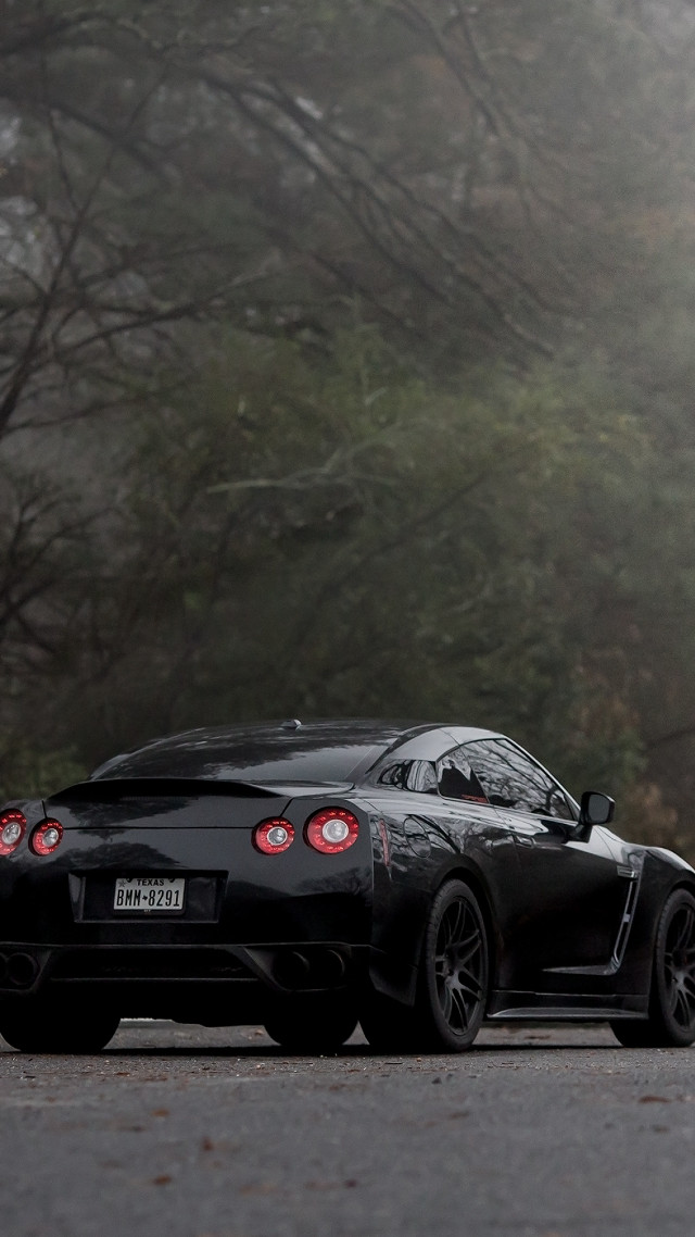 Black sports car foggy road free wallpaper for mobile - medium preview image