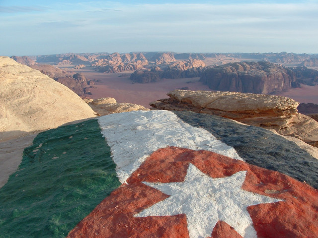 Flag painted rock desert mountains free wallpaper for desktop - medium preview image