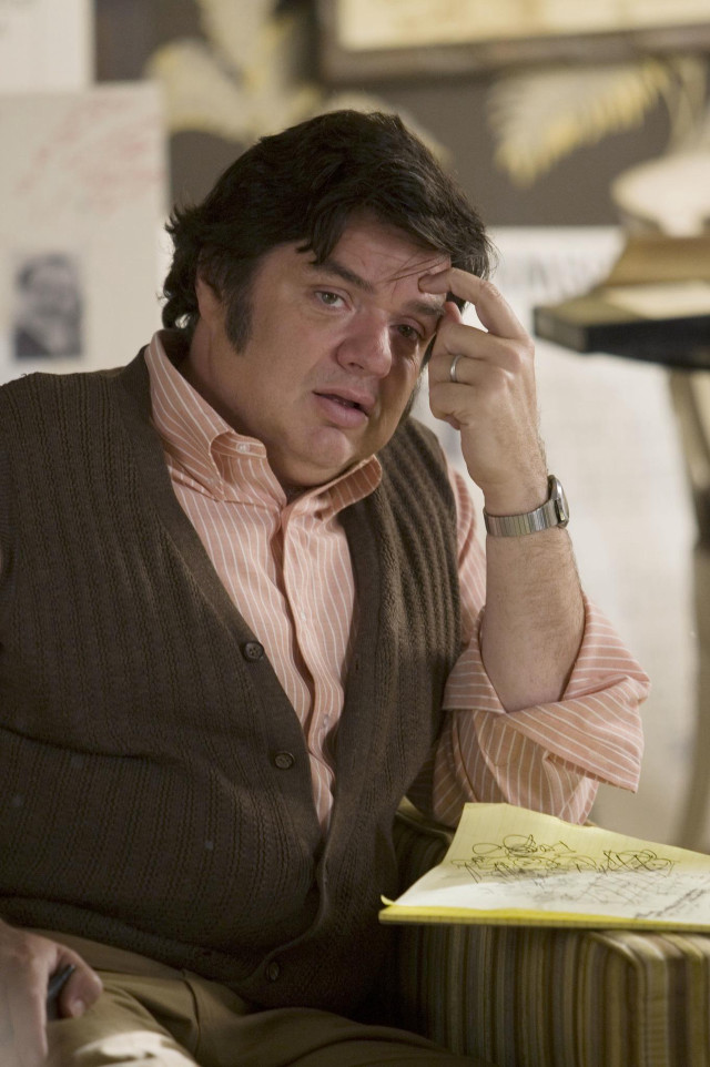 Man sitting cellphone book pinstripe free wallpaper for mobile - medium preview image