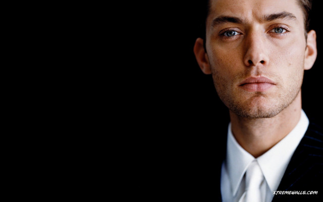 Man suit tie serious expression #7 free wallpaper for desktop - medium preview image