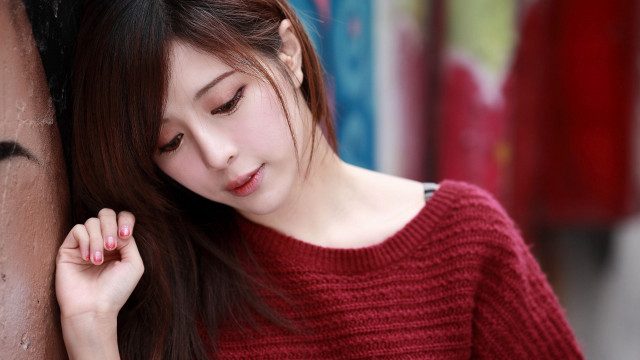 Woman leaning wall hand head #3 free wallpaper for desktop - medium preview image