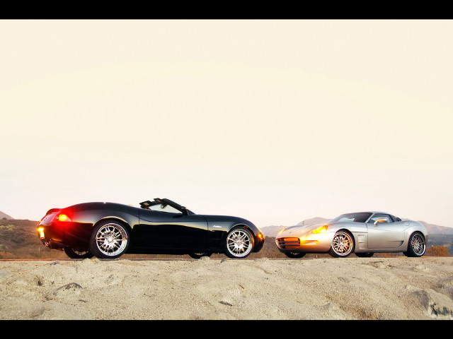 Two cars parked road mountain free wallpaper for desktop - medium preview image