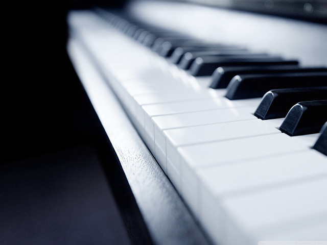 Piano keyboard closeup black background free wallpaper for desktop - medium preview image