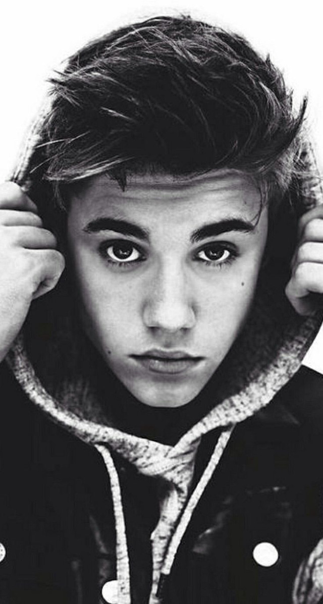 Young man hoodie serious face free wallpaper for mobile - medium preview image