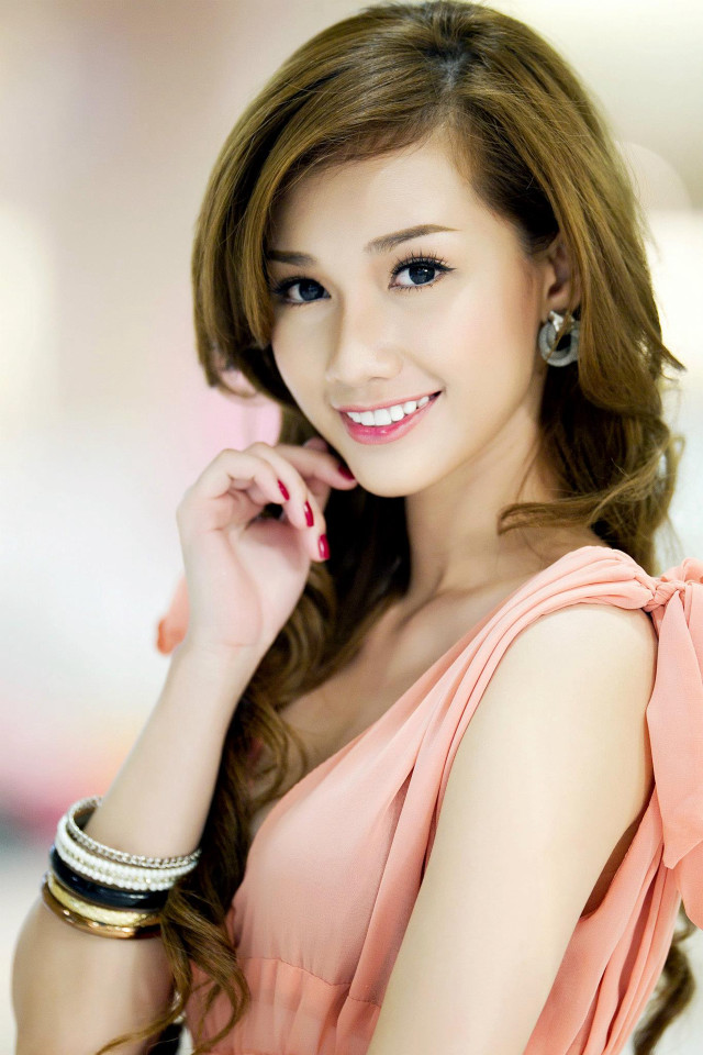 Woman pink dress posing hand free wallpaper for mobile - medium preview image